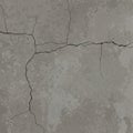 Cracked concrete surface featuring irregular lines and uneven texture Royalty Free Stock Photo