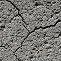 Cracked concrete surface with a rough, Royalty Free Stock Photo