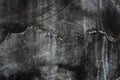 cracked concrete wall covered with gray cement surface as background Royalty Free Stock Photo