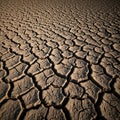 Cracked, dry earth characterized by irregular, angular patterns covers the surface, Royalty Free Stock Photo