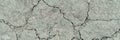Cracked dry earth texture with visible fissures and rough surface pattern Royalty Free Stock Photo