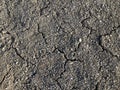 Cracked dry ground mud, dried under sun road Royalty Free Stock Photo