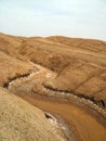 Dried river bed in desert Royalty Free Stock Photo