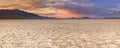 Cracked earth in remote Alvord Desert, Oregon, USA at sunset Royalty Free Stock Photo