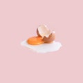 Cracked egg on pastel Royalty Free Stock Photo