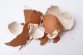 Cracked egg shells on white Royalty Free Stock Photo