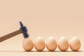 Cracked eggshell hit by hammer Royalty Free Stock Photo