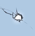 Cracked element on broken window, texture for design. A hole in the center of the blue glass. Royalty Free Stock Photo