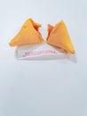 Cracked fortune cookie with a positive message Royalty Free Stock Photo