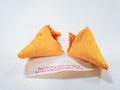 Cracked fortune cookie with a positive message Royalty Free Stock Photo