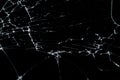 Cracked glass isolated on a black background. Royalty Free Stock Photo