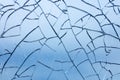 Cracked glass macro blue background high quality prints Royalty Free Stock Photo