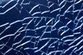 Cracked glass macro blue background high quality prints Royalty Free Stock Photo