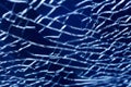 Cracked glass macro blue background high quality prints Royalty Free Stock Photo