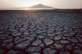 Cracks on the surface of the earth are altered by the shrinkage of mud due to drought conditions of the terrain Royalty Free Stock Photo