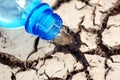 Cracked ground with empy bottle Royalty Free Stock Photo