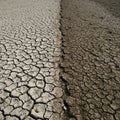 Cracked ground shows two distinct textures and colors. The left side is lighter with Royalty Free Stock Photo