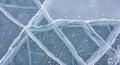 cracked ice surface with frozen bubbles. Royalty Free Stock Photo