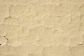 Cracked mud plaster wall closeup Royalty Free Stock Photo