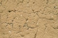 Cracked mud plaster wall closeup, Royalty Free Stock Photo