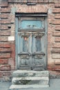 Cracked paint on the old vintage wooden door