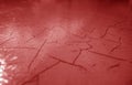 Cracked paint texture in red color