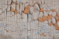 Cracked paint on a wooden wall. Wall from wooden planks with paint traces. Royalty Free Stock Photo