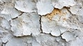 Cracked, peeling white paint on a textured wall surface Royalty Free Stock Photo