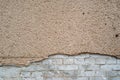 Cracked plaster and brick