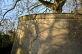 Cracked retaining walls of an old baroque bastion. The terrace has become a place for an old plane tree that grows on top and the Royalty Free Stock Photo