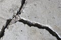 Cracked road concrete close up