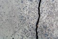 Cracked road concrete close up.