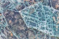 Cracked and shattered glass. Abstract texture and background. Broken glass close-up on the ground Royalty Free Stock Photo