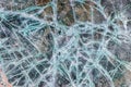 Cracked and shattered glass. Abstract texture and background. Broken glass close-up on the ground Royalty Free Stock Photo