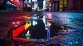 A cracked sidewalk dotted with puddles surrounded by tall buildings and flashing neon signs. The rain intensifies Royalty Free Stock Photo