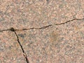 Cracked sidewalk. After the earthquake. Crack on the floor. The texture with destruction.