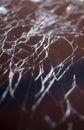 Cracked smart phone screen close-up. Broken glass texture background with cracks