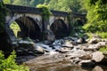 a cracked stone arch bridge ready to collapse