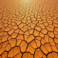 Cracked, sun-baked earth displays large, irregular polygons typical of arid or drought- Royalty Free Stock Photo