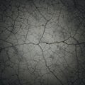 A cracked surface with an irregular, intricate pattern. Dark gray tones dominate, Royalty Free Stock Photo
