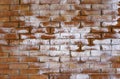 Cracked vintage brick wall background half covered with salt Royalty Free Stock Photo