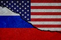 Cracked wall with painted united states and russia flags Royalty Free Stock Photo