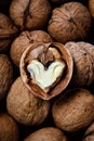 The cracked walnut with heart-shaped core Royalty Free Stock Photo