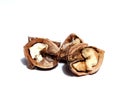 Cracked walnuts close up on white Royalty Free Stock Photo