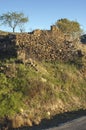 Cracked and weathered old stone wall Royalty Free Stock Photo