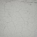 Cracked white surface with an intricate network of irregular lines and shapes, Royalty Free Stock Photo