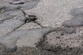 Cracked whole in the asphalt road Royalty Free Stock Photo