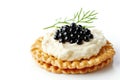 crackers with cream cheese and black caviar, white backgroud. Generative AI.