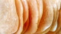 Crackers made from a dough of tapioca flour and finely ground shrimp with spices and flavor enhancers