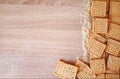 Crackers with sesame seeds on a wooden background